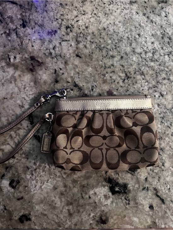 Coach Handbags - Coach Brown Signature Canvas Wristlet with Metallic Trim